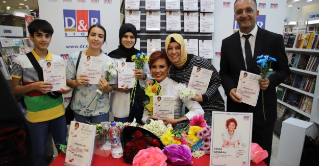 Yelda Başaran ilk İmza gününde kadınları Çiçeklerle Taçlandırdı