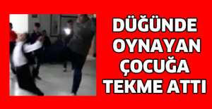 Düğünde oynayan çocuğa tekme attı