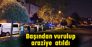Başından vurulup, araziye atıldı
